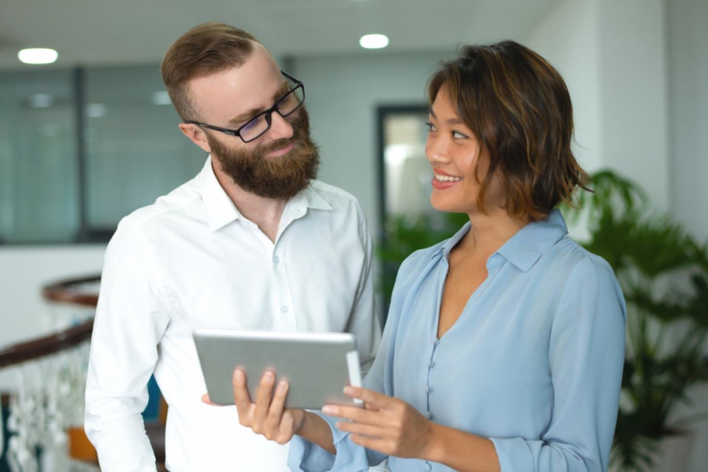 Collaborative team reviewing search ranking data and optimization metrics